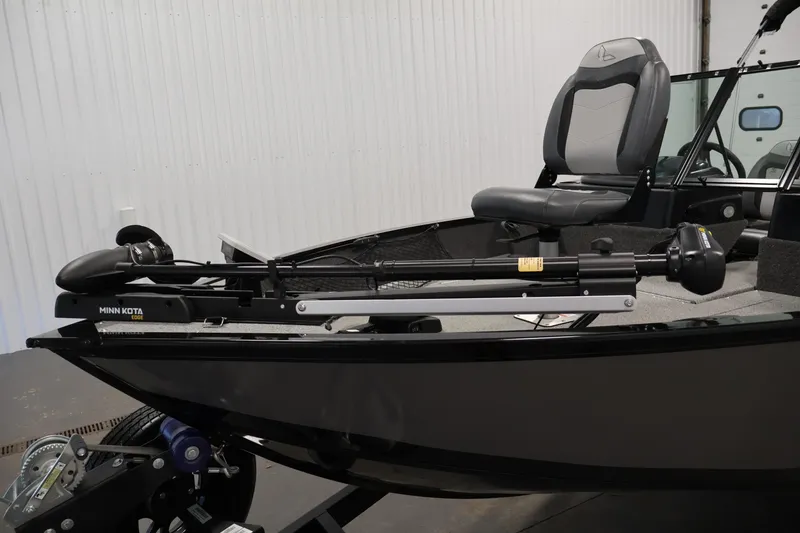Slide: The Image of 2024 Lowe Fishing Machine 1775WT with Minn Kota trolling motor, sleek design. - 11