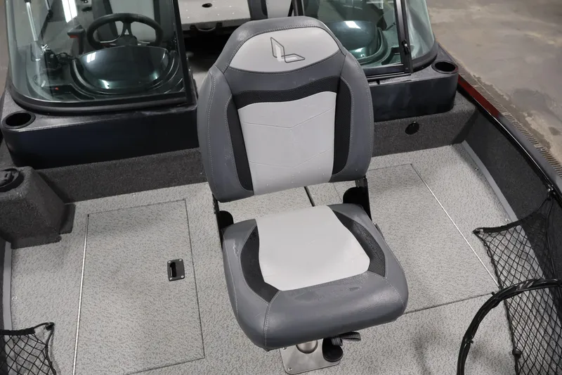Slide: The Image of 2024 Lowe Fishing Machine 1775WT boat interior with a comfortable swivel seat. - 17