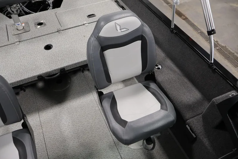 Slide: The Image of 2024 Lowe Fishing Machine 1775WT interior with gray and white seating. - 31