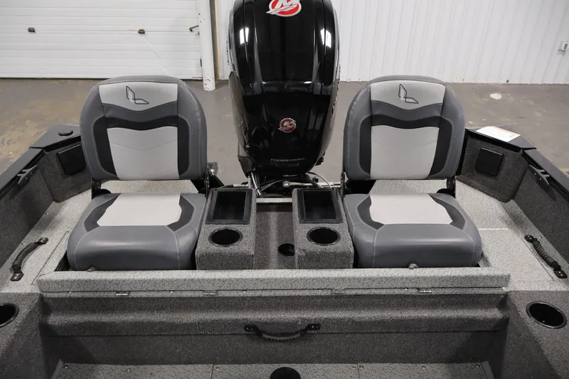 Slide: The Image of 2024 Lowe Fishing Machine 1775WT interior with dual seats and motor, showcasing modern design. - 37