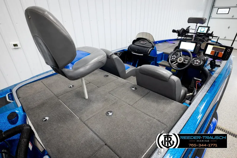 Slide: The Image of 2008 Triton 20X2 DC boat interior with seating and control panel, Reeder-Trausch Marine. - 11