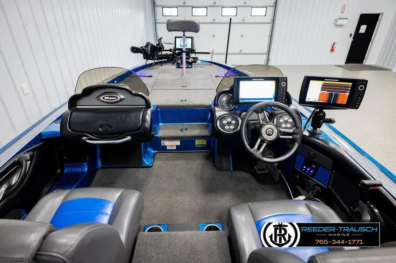 Slide: The Image of 2008 Triton 20X2 DC boat interior with advanced navigation systems and comfortable seating. - 13