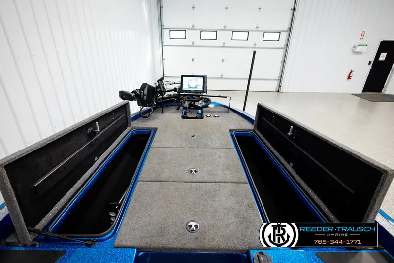 Slide: The Image of 2008 Triton 20X2 DC boat interior with storage compartments and control panel. - 25