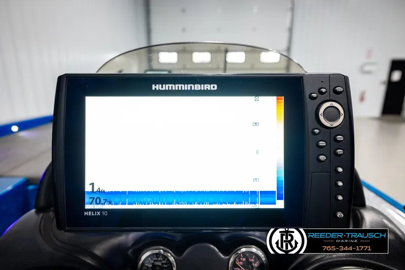 Slide: The Image of Humminbird Helix 10 fish finder on 2008 Triton 20X2 DC boat dashboard. - 31