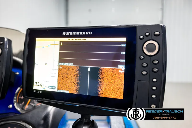 Slide: The Image of Humminbird Helix 10 fish finder on 2008 Triton 20X2 DC boat, displaying sonar data. - 35