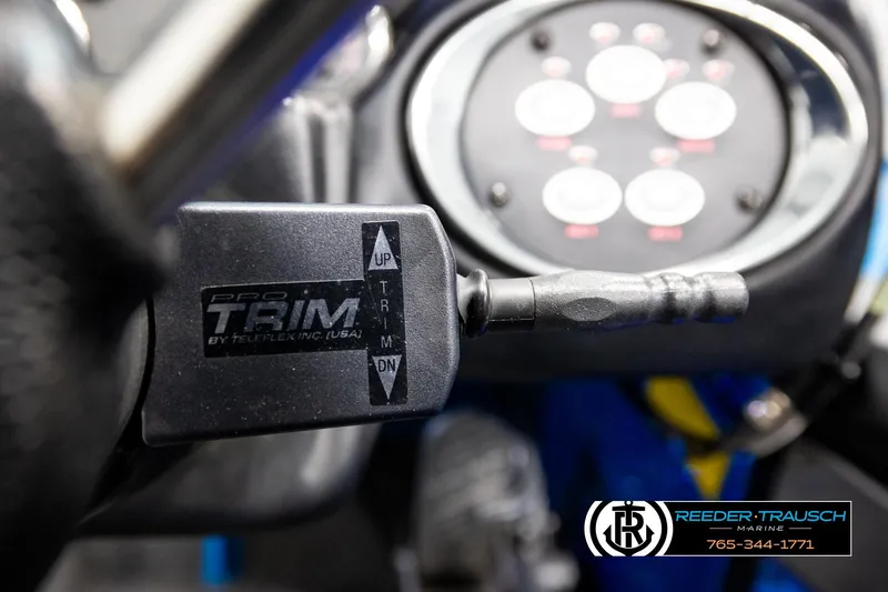 Slide: The Image of Close-up of 2008 Triton 20X2 DC boat's Pro Trim control lever by Teleflex. - 36
