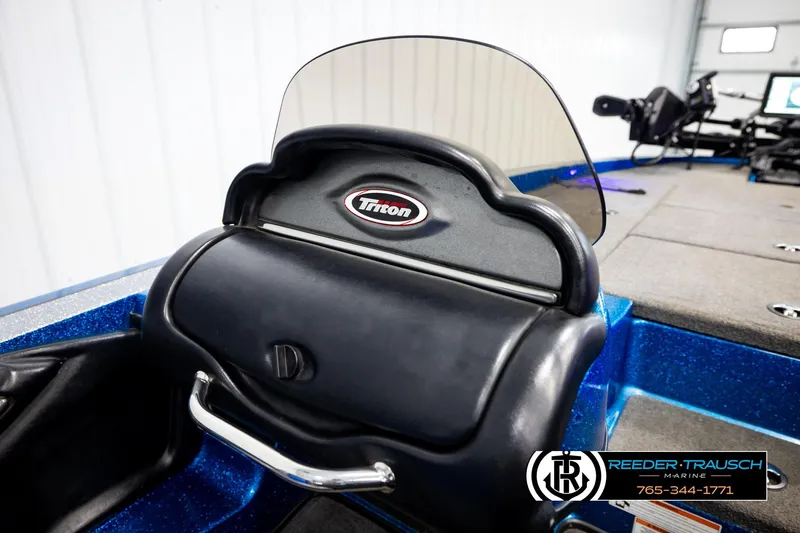 Slide: The Image of 2008 Triton 20X2 DC boat interior with dashboard and logo, Reeder-Trausch Marine branding. - 40