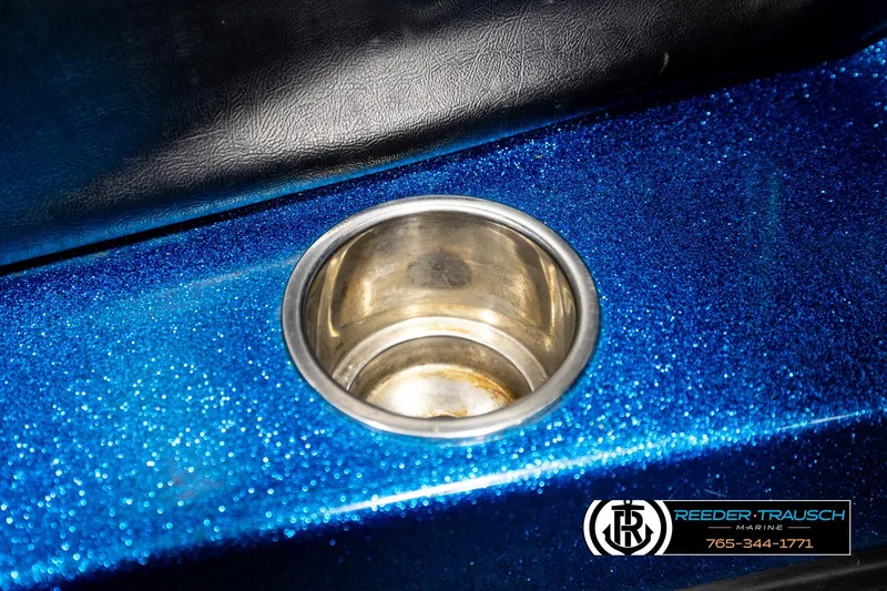 Slide: The Image of 2008 Triton 20X2 DC boat with metallic blue finish and stainless steel cup holder. - 41