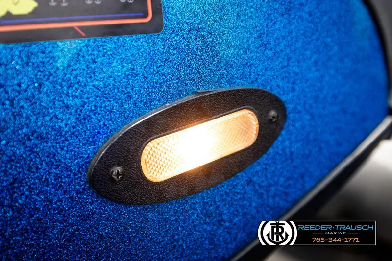 Slide: The Image of Close-up of a 2008 Triton 20X2 DC boat's illuminated side marker light. - 42