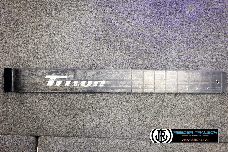 Slide: The Image of 2008 Triton 20X2 DC boat part on gray carpet, Reeder-Trausch Marine logo visible. - 43