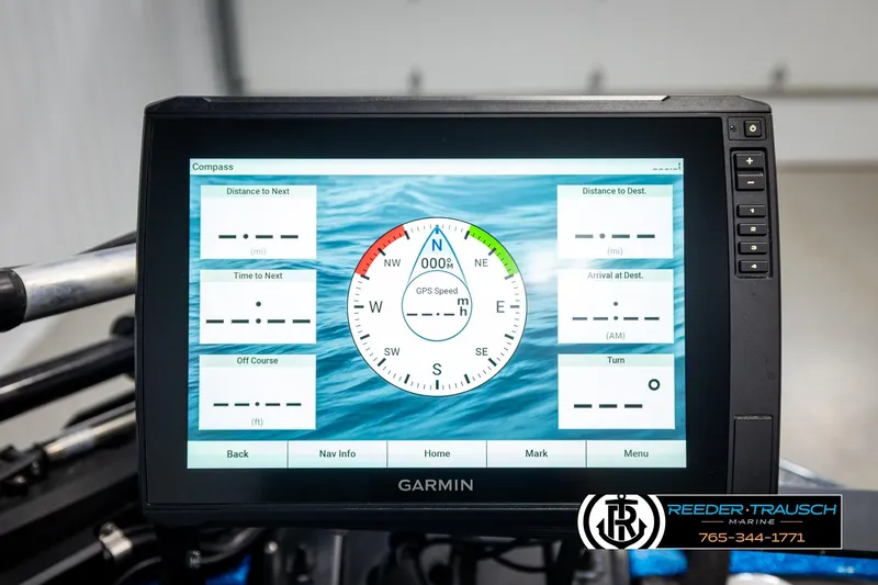 Slide: The Image of Garmin navigation display on 2008 Triton 20X2 DC boat, showing compass and trip data. - 46