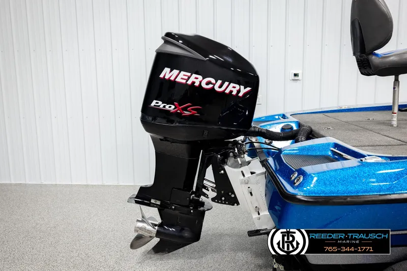 Slide: The Image of 2008 Triton 20X2 DC boat with Mercury Pro XS outboard motor in showroom. - 49