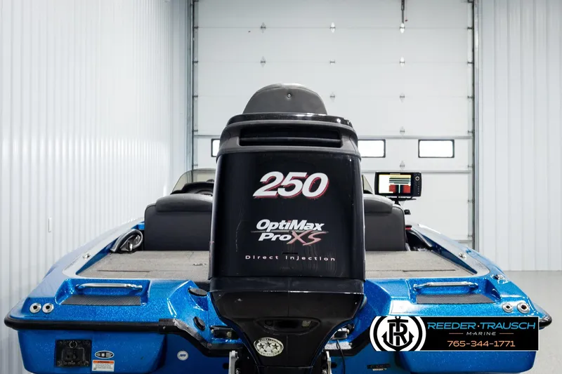 Slide: The Image of 2008 Triton 20X2 DC boat with OptiMax Pro XS 250 engine in a garage. - 6