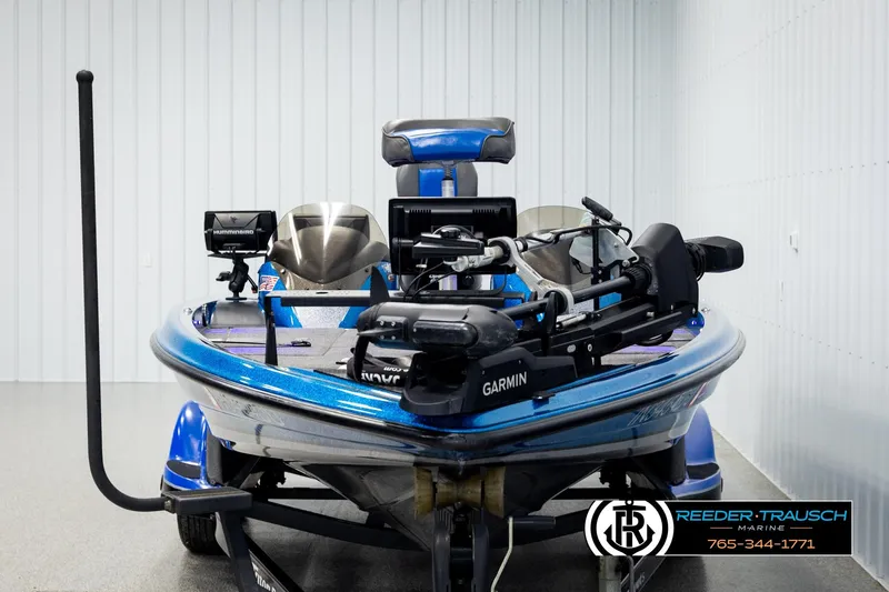 Slide: The Image of 2008 Triton 20X2 DC bass boat with Garmin and Humminbird electronics in showroom. - 7