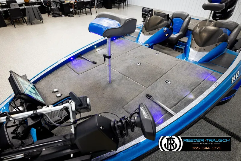 Slide: The Image of 2008 Triton 20X2 DC boat interior with advanced navigation equipment and seating. - 9