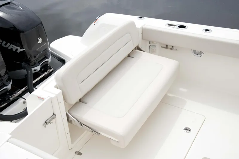 Slide: The Image of Manufacturer Provided Image: 2016 Boston Whaler 270 Vantage boat with Mercury engines and white seating. - 13