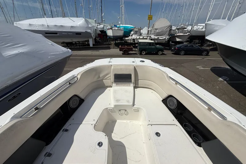Slide: The Image of 2016 Boston Whaler 270 Vantage boat interior view at marina. - 32
