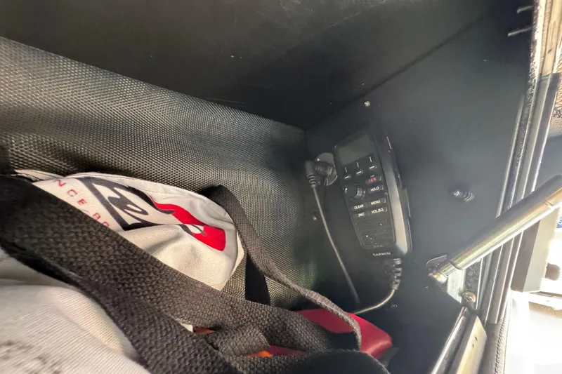 Slide: The Image of 2024 Nor-Tech 400 Supersport interior with Garmin device and branded bag. - 12