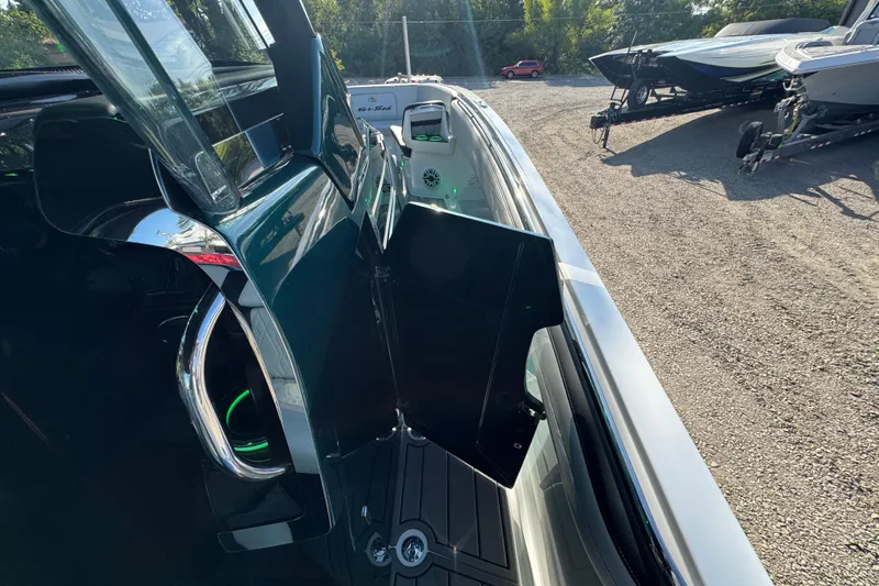 Slide: The Image of 2024 Nor-Tech 400 Supersport boat with sleek design and modern features. - 16