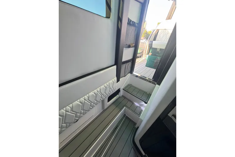 Slide: The Image of 2024 Nor-Tech 400 Supersport interior with sleek seating and modern design elements. - 29