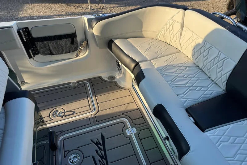 Slide: The Image of 2024 Nor-Tech 400 Supersport interior with luxurious seating and stylish flooring. - 32