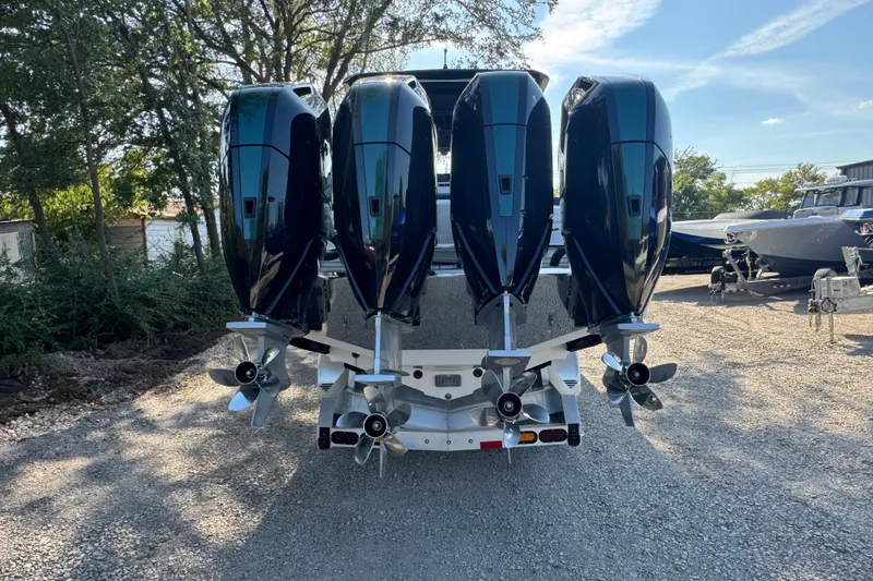 Slide: The Image of 2024 Nor-Tech 400 Supersport with four powerful outboard engines, rear view. - 5