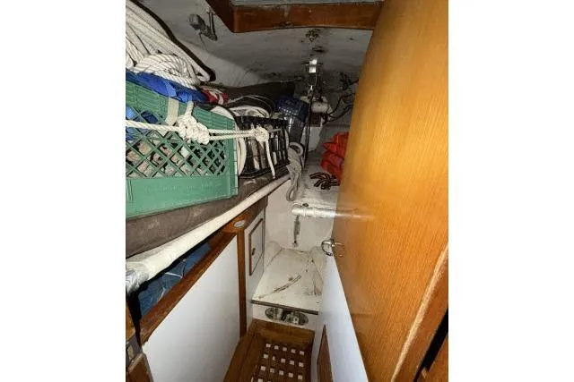 Slide: The Image of Interior of 1980 Mao Ta Skye 51 sailboat with storage and nautical equipment. - 26