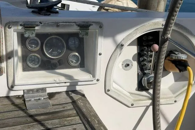 Slide: The Image of Control panel of a 1980 Mao Ta Skye 51 sailboat with gauges and wiring. - 42
