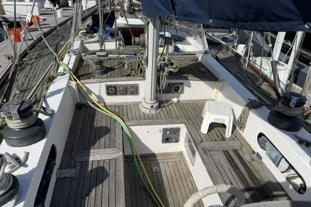 Slide: The Image of Cockpit of 1980 Mao Ta Skye 51 sailboat with wooden deck and nautical equipment. - 43