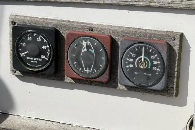 Slide: The Image of Vintage Mao Ta Skye 51 boat gauges from 1980, displaying wind speed and direction. - 45