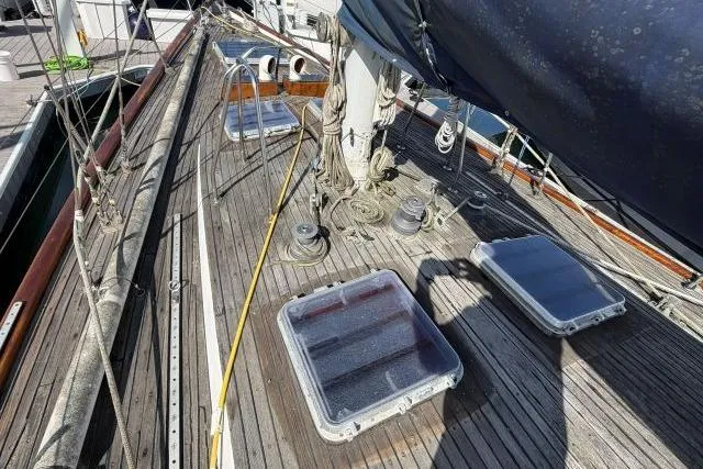 Slide: The Image of Deck view of 1980 Mao Ta Skye 51 sailboat with hatches and rigging. - 54