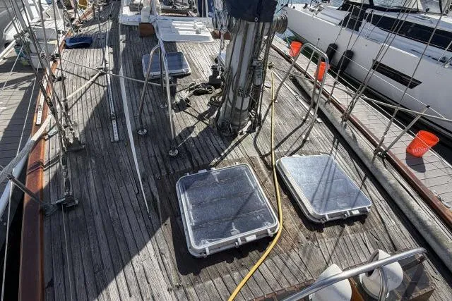 Slide: The Image of Deck of 1980 Mao Ta Skye 51 sailboat with hatches and rigging. - 57