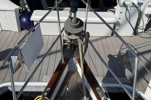 Slide: The Image of Bow of 1980 Mao Ta Skye 51 sailboat with anchor and deck details. - 64