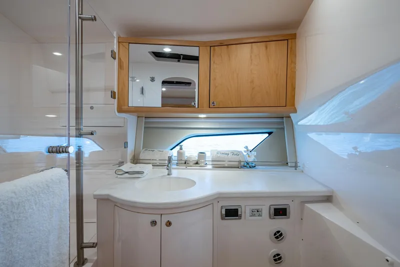 Slide: The Image of Luxurious bathroom interior of 2023 Intrepid 477 Evolution yacht with modern fixtures. - 27
