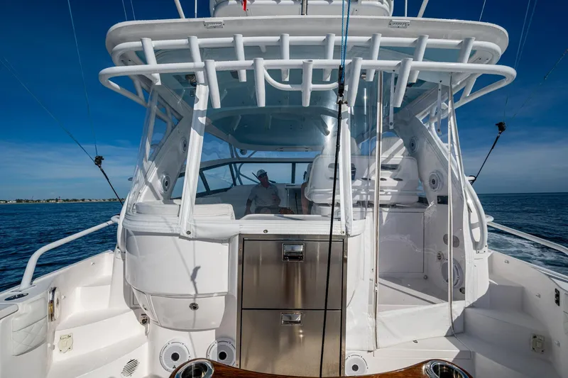 Slide: The Image of 2023 Intrepid 477 Evolution boat on open water, showcasing sleek design and modern features. - 42