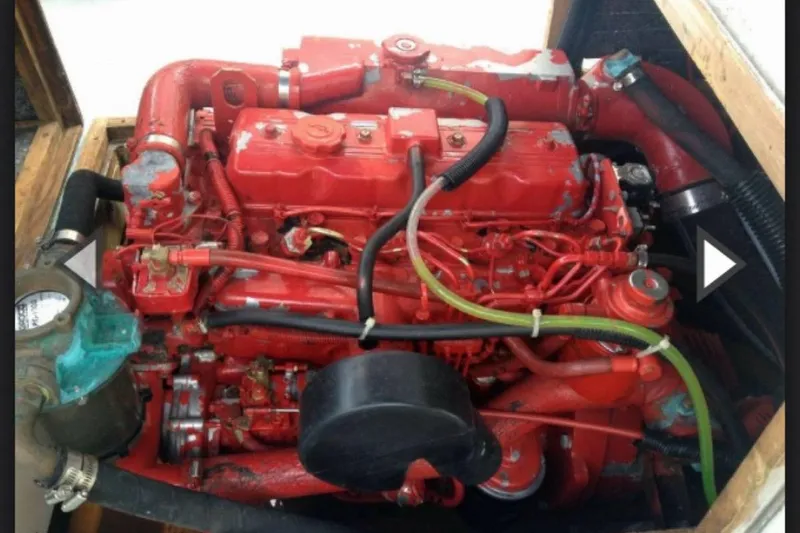 Slide: The Image of Red engine of a 1984 BHM CC Flye Point Launch, detailed view. - 15