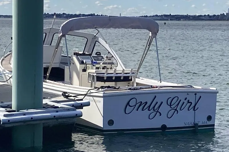 Slide: The Image of 1984 BHM CC Flye Point Launch boat named "Only Girl" docked in Nahant, MA. - 2