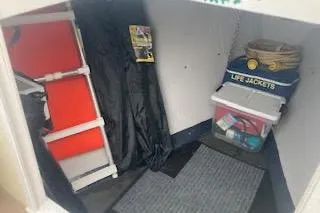 Slide: The Image of Storage area in 1984 BHM CC Flye Point Launch with life jackets and equipment. - 8