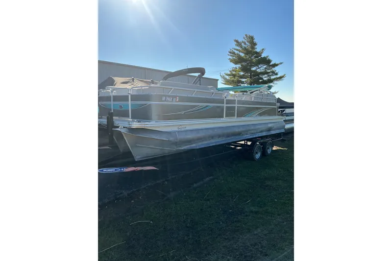 The Image of 2021 Qwest LS 824 Lanai DS Bar pontoon boat on trailer, sunny day. - 1
