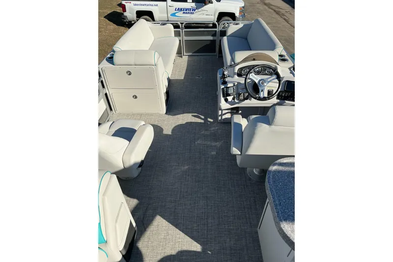 Slide: The Image of 2021 Qwest LS 824 Lanai DS Bar interior with seating and steering console. - 13