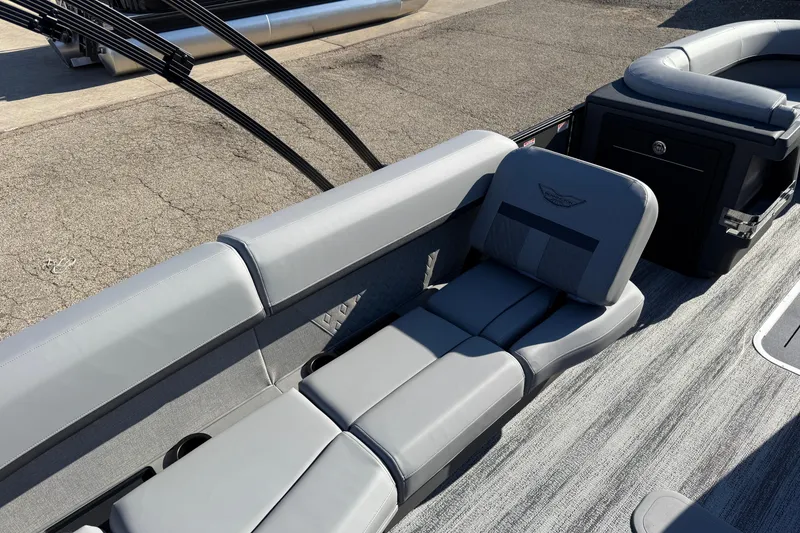 Slide: The Image of 2026 Bennington 24 M Sport Lounge Quad Bench with sleek gray seating and modern design. - 23