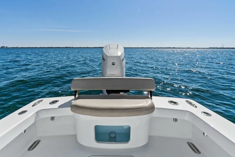 Slide: The Image of 2024 Custom Center Console High Ground Boatworks on open water, rear view. - 40