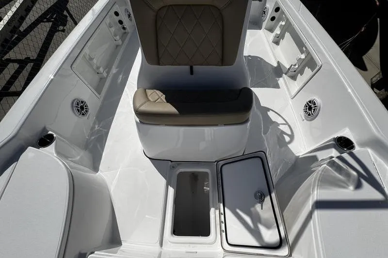 Slide: The Image of 2026 Blazer PureBay 2200 boat interior with seating and storage compartments. - 13