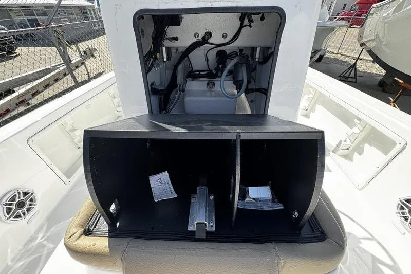 Slide: The Image of 2026 Blazer PureBay 2200 boat interior showing storage compartment and wiring. - 15