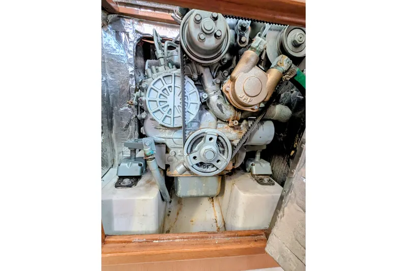 Slide: The Image of Engine of a 2003 Catalina 34 MkII sailboat, showcasing mechanical components. - 15