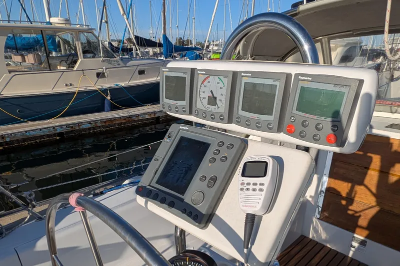 Slide: The Image of Cockpit instruments of a 2003 Catalina 34 MkII sailboat at a marina. - 21