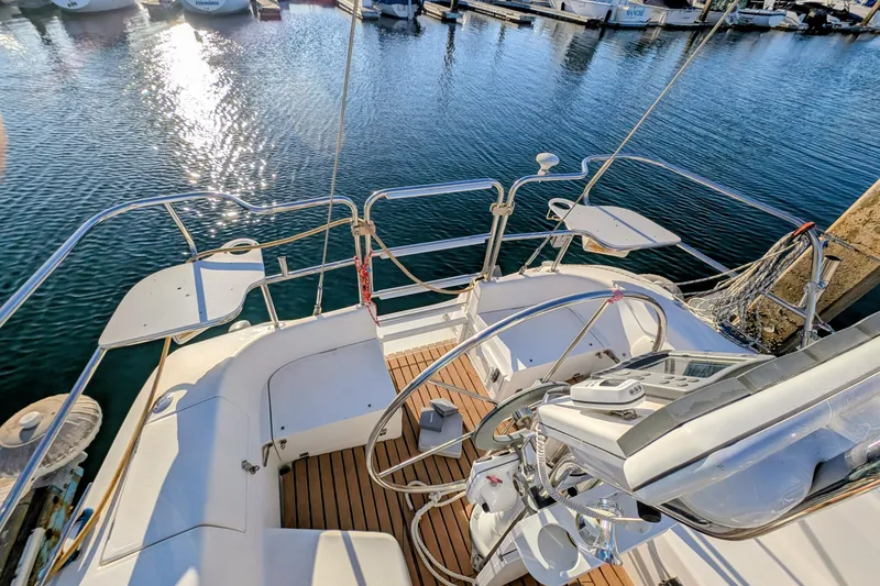 Slide: The Image of Cockpit view of 2003 Catalina 34 MkII sailboat docked in marina. - 24
