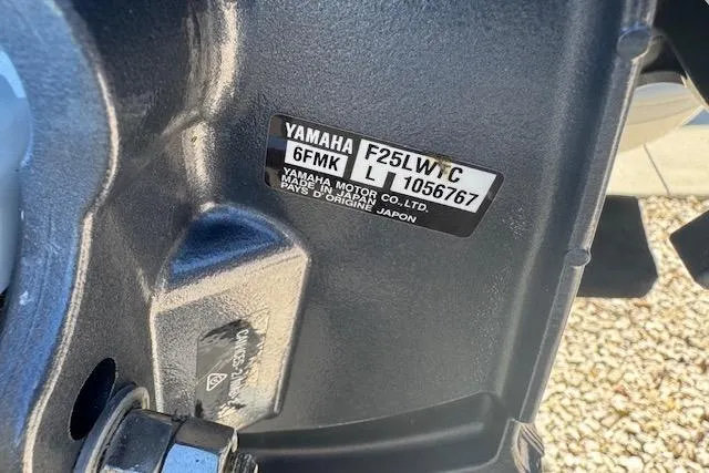 Slide: The Image of Yamaha motor label on 2024 Rigid Boats 10 Sport, model F25LW/C, serial 1056767. - 4
