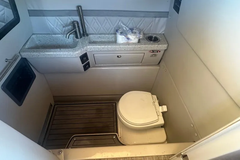 Slide: The Image of Compact bathroom in 2017 Harris V270 boat with sink and toilet. - 23