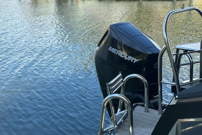 Slide: The Image of Harris V270 boat with Mercury engine on calm water, 2017 model. - 24